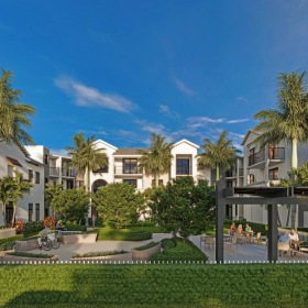 a building with trees and grass