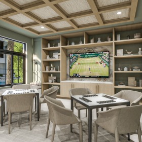 a group of people sitting around a game table in a room with a tv 